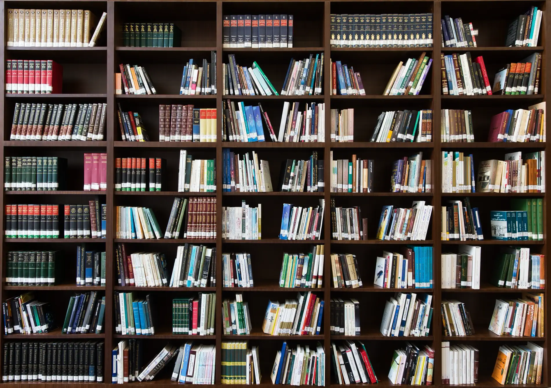Editor proofreading an academic research paper with correction marks